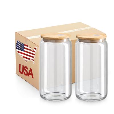 China Sustainable 12oz 16oz Frosted Clear Coffee Soda Mug Sublimation Beer Glass Can With Bamboo Lid And Plastic Straw for sale