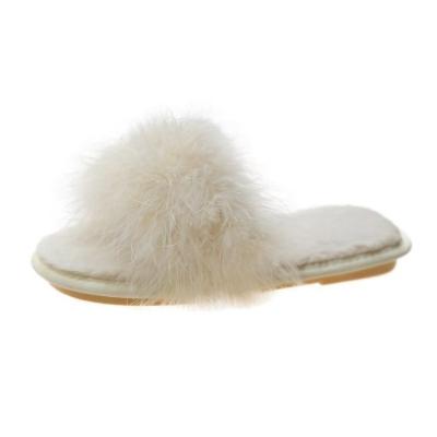 China Disposable Women's White Fluffy Ostrich Fur Hairy Sliders House Slippers Comfortable Open Toe House Shoes for sale