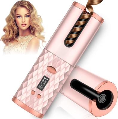 China USB Rechargeable Portable Wireless Hair Curler Automatic Rotating Hair Hesitate Curling Iron Styling for sale