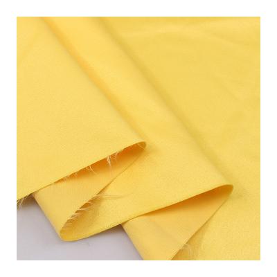 China Wholesale 85%poly 15% tough waterproof microfiber peach skin fabric nylon soft for shorts swimming jacket for sale