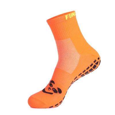 China Breathable Custom Color Cartoon Logo Black PVC Grip Socks Orange Trampoline Park Socks Play Ground Grip Socks for sale