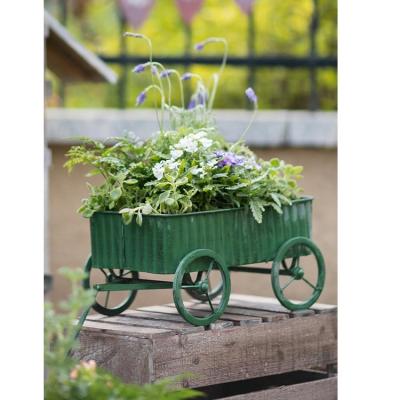 China Eco-friendly outdoor garden model wheel decoration handcraft wheelbarrow planter zic stand for sale