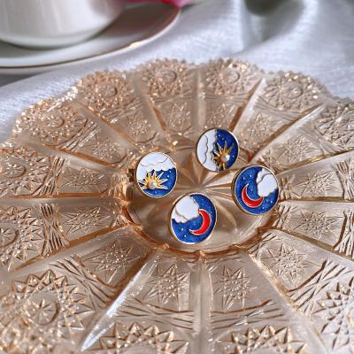 China Environmentally Friendly Wholesale Asymmetric Enamel 925 Silver Needle Earrings Sun Moon Temperament Drop for sale