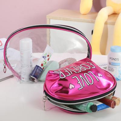 China Large capacity wholesale ladies PVC clear cosmetic bag travel makeup bag fashion two in one shinny cosmetic bag set for sale