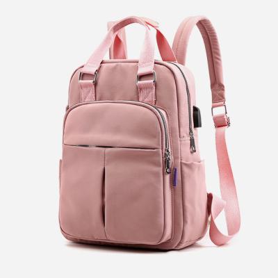 China Fashion Waterproof Girls Boys Backpack Fashionable High School Backpack With USB Charging Large Capacity Travel Bag With Laptop Compartment for sale