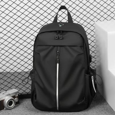 China Fashion Trend Schoolbag Waterproof Travel Backpack Male College Student Light Leisure Backpack With Computer Compartment for sale