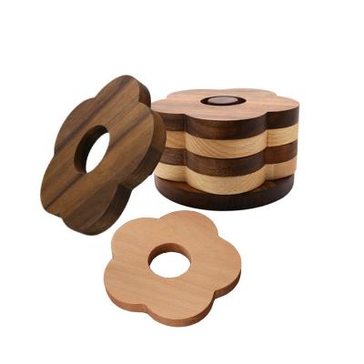 China Sustainable Beech Special Walnut Shape Flower Fashion Design Coffee Tea Cup Coasters Drinking Mats for sale