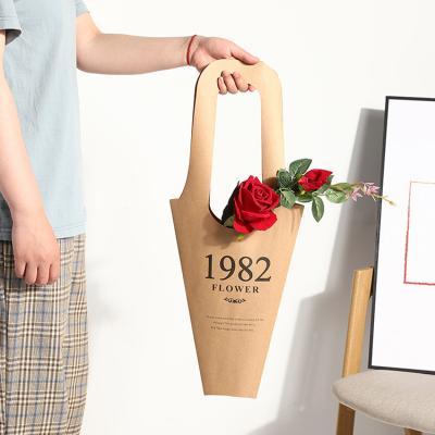 China Wholesale Customizable Florist Bag with Handle, Portable Florist Paper Wrapping Gift Recyclable Plant Decorative Wrapping Paper Bag for sale