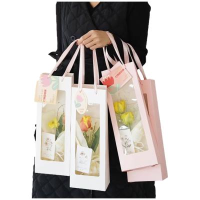 China Factory Wholesale Custom Flower Rose Packaging Kraft Paper Carry Bag PVC Window Recyclable, Packaging Bag Flower Bouquet Bag Ribbon Handle for sale