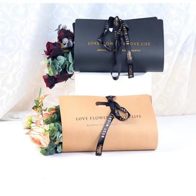 China OEM Recyclable Factory Design New Fashion Flower Carrier Wrapping Sleeve, Rose Flower Bouquet Wrapping Kraft Paper With Ribbon Closure for sale