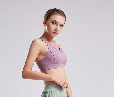 Chine Le tissu mou X attachent les sports des femmes arrières que le soutien-gorge a capitonné l'humidité wicking à vendre