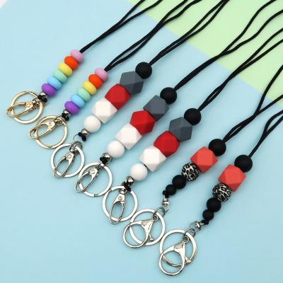 China Durable Silicone Bead Lanyards For ID Badge Teacher Fashionable Lanyard Beaded With Wooden Disc for sale