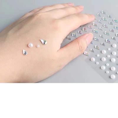 China Hot Selling Self Adhesive Face Crystal Jewels Rhinestones Gem 2022 Popular Eco-friendly Material Body Tattoo Sticker for sale