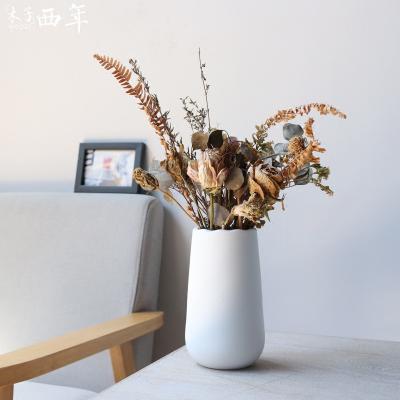 China Southwestern simple creative horizontal ceramic vase biscuit stripes decoration vase handwork white ceramic home wave for sale