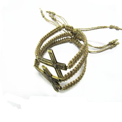 China Luxurious tenacity gold rope bracelet with metal cross and corss bracelet supplier for sale