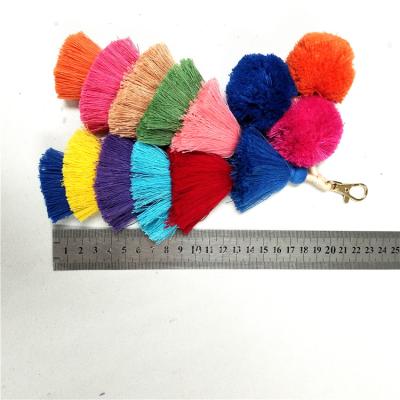 China Eco-friendly colorful decorative craft cotton pompom tassel for bag and handmade pompom tassel for Australia market for sale