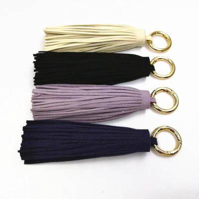 China Handmade fashion colorful leather tassel key chain for decoration curtion mobile phone bag for sale