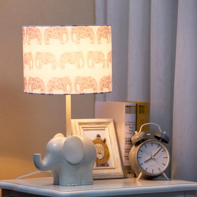 China Modern Style Fabric Shade Long Area Cord Resin Elephant Base Kids Eye Table Lamps Desk Use Care Light for sale