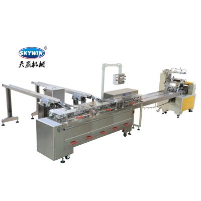 China High Speed ​​Full Automatic Bakery Energy Bar Cookie / Cream Flow Cookie Packing Line Biscuit Sandwich Machine for sale