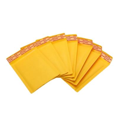 China Stock Design Biodegradable Yellow Kraft Paper Mailer Bag Bubble Mailers Waterproof Waterproof Packing Bubble Bag for sale