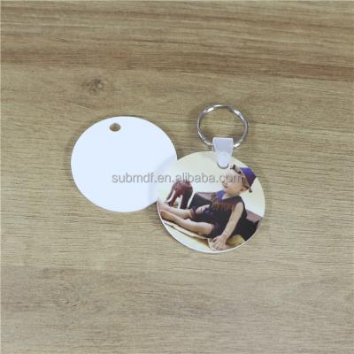 China Custom Double Sided Sublimation Plastic Logo Promotion Environment Friendly Round FRP Key Chain for sale