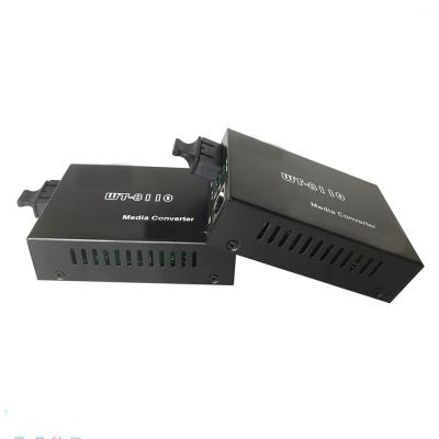 China FTTX CAT5 100m 10/100/1000Base-Tx to 1000Base-Fx Transmission Fiber Optic Media Converter for sale