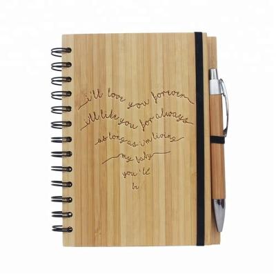 China Promotional Eco-Friendly Cover Spiral Bamboo Hard Elastic Band Engraving I Love You Notebook Matching With Pen for sale