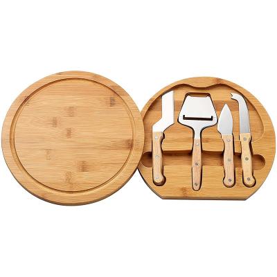 China Stocked Print Custom Laser Engrave Circular Rotating Wooden Cheese Tray Bamboo Cutting Board Set With 4 Pieces Cutlery for sale