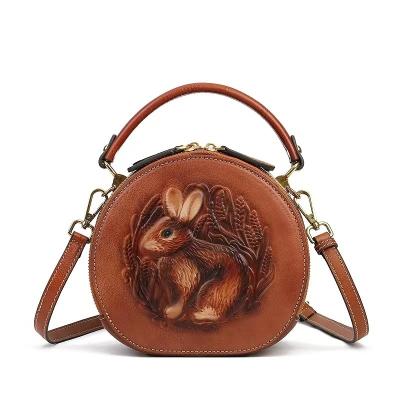 China Fashion Illustration Original Vintage Genuine Leather Handmade Round Cross - Body Bag Women for sale