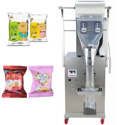 China Double Head 500g Food Packaging Machine Granule Powder Filling Snacks Weighing Mix Packaging Machine for sale