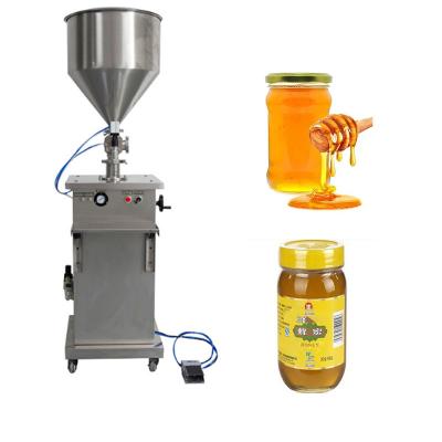 China Food Manual Bottle Filling Machine Multifunctional Liquid Viscous Liquid Box Packing Machine for sale