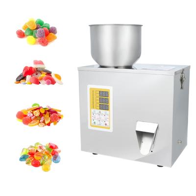 China Small Scale Food Grain Powder Filling Machine Granule Tablet Weighing Filling Packing Machine for sale