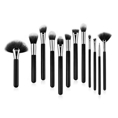 China Angular Blush Pro Art Cosmetics Makeup Brushes Nylon Hair Customized Black Powder Makeup Brushes for sale