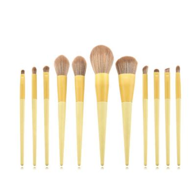 China Manufacturer Pink Yellow Wood Handle 11Pcs Makeup Brush Set Skin-friendly Cosmetic Brushes for sale