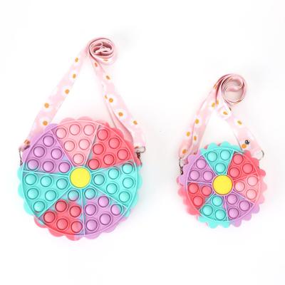 China Soft/Durable 2022 New Design Silicone Sunflower Relaxation Coin Purse Body Bag Kids Cross Shoulder Bubbles Pop Bag for sale