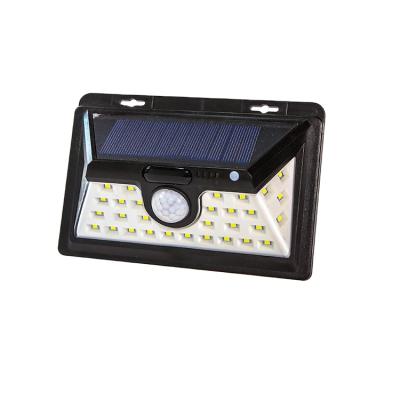 China Wholesale 34 LED Waterproof Motion Sensor Yard Garden Solar Wall Light with Outdoor for sale