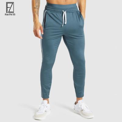 China Wholesale Breathable Side Stripe Mens Track Wear Sport Terry Slim Fit Plain Men French Jogger Pants for sale