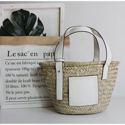 China 2021 Straw Woven Woven Bag Aquatic Straw Soft Portable Woven Straw Beach Bag Multi-size One-shoulder Bag for sale