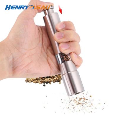 China Viable Pepper Grinder One Hand Manual Press Bottle Pepper Grinding Rechargeable Stainless Steel Spice Grinder Mill for sale