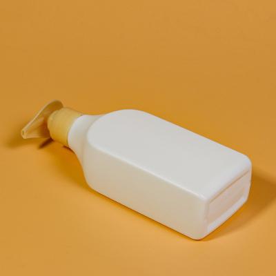 China Cosmetic Custom Plastic Pole Flattened Shampoo Bottle Plastic Bottle With Pump for sale