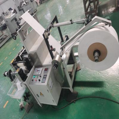 China High Speed ​​Disposable Nonwoven Fabric Hotels Face Clean Towel Roll Making Machine for sale