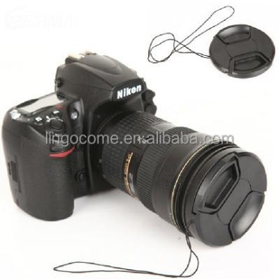 China Snap 62mm Central Plastic Pinch On Front Lens Cap Cover For Canon Nikon With String for sale