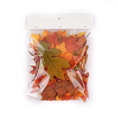 China Free Sample Fabric Artificial Leaf By The Yard Autumn Harvest Maple Fall Leaves Decorative In A Bag for sale