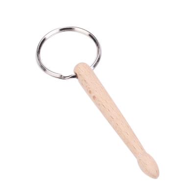 China Popular European and American European and American Style Wooden Beech Trap Stick Pendant Environmental Friendly Fashion Key Chain Wooden Keychain for sale