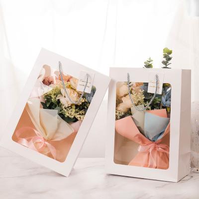 China Women's Handmade Daisy Flower Bouquet Floral Wrapping Bag Window Paper Transparent Valentine's Day Floral Roses Carry Bags for sale