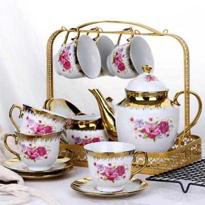 China Sustainable Light Luxury Retro Coffee Cup And Saucer With Shelf Pull Nordic Flower Gold Plated Ceramic Tea Cup for sale