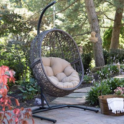 China Modern Online Sale New Gray KD Rattan Patio Swing Egg Chair 2021 Wicker Garden Furniture Hanging Outdoor Chair for sale