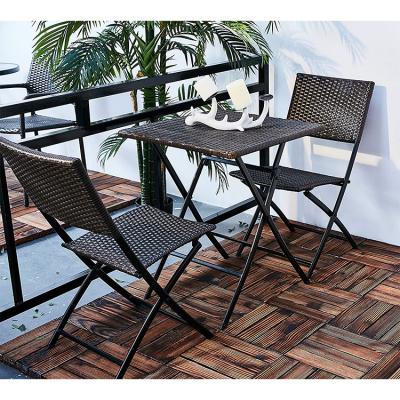 China Modern Cheap Factory Wholesale Black Rattan 3Pieces Bistro Set Wicker Metal Foldable Patio Table and Chair Set for sale