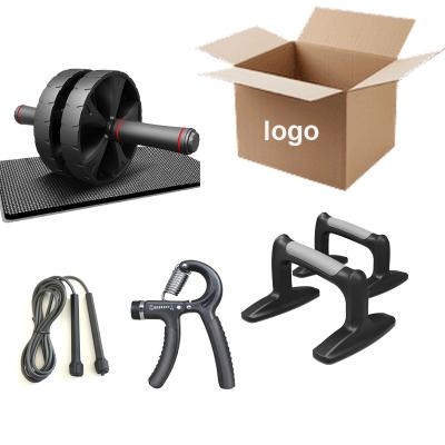 China Universal fitness exercise push up bar jump ropehand grip 4 in wheel 1ab roller set with knee pad for sale