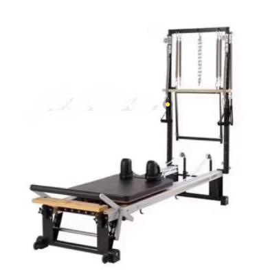 China Aluminum Pilates Machine Functional Trainer Yoga Pilates Reformer With Half Trapeze 2380*750*460mm for sale